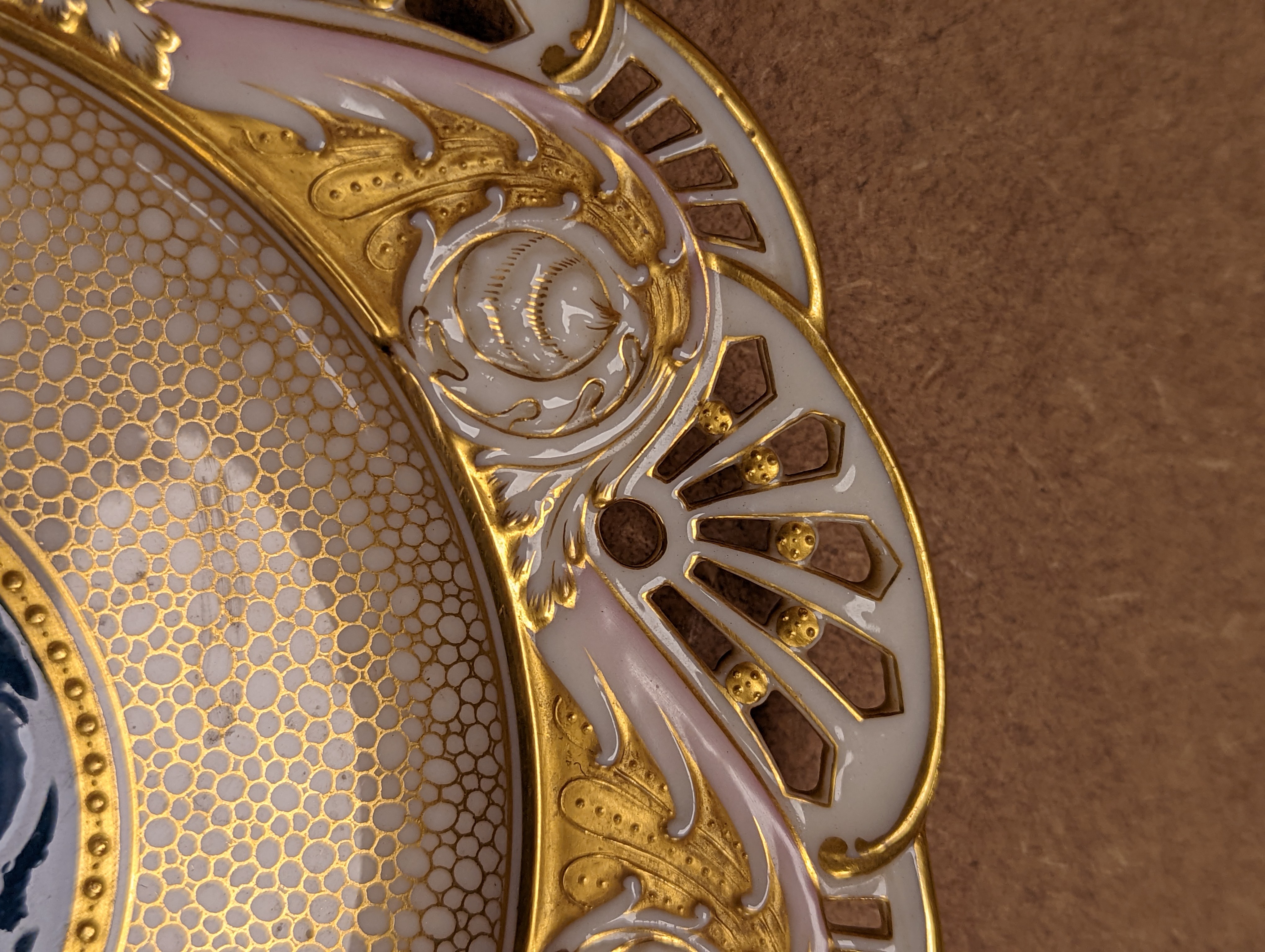 A Mintons pate sur pate cabinet plate, attributed to Alboin Birks, c.1905, diameter 23cm